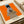 Abstract expressionist poster of a fragmented figure suspended in burnt orange and grey, capturing existential tension and psychological disturbance.