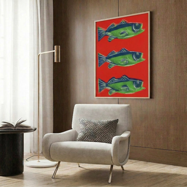 Pop art wall poster of a red fish with simplified form and bright saturated color, displayed in modern interior frame.
