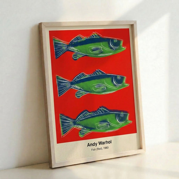 Modern pop art fish design rendered in hot pink, red, and orange with playful, energetic brushwork and high-contrast black and white elements.