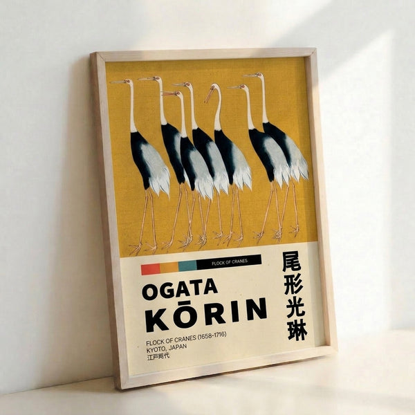Japanese woodblock poster featuring a serene gathering of cranes in cream and gold against dark accents, displaying the refined artistic style of Korin in a framed presentation.