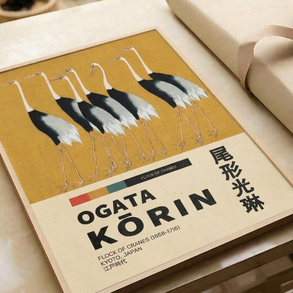 Contemplative Asian art print displaying cranes in graceful motion through a traditional woodblock composition of gold, black, and cream, mounted as sophisticated wall décor.