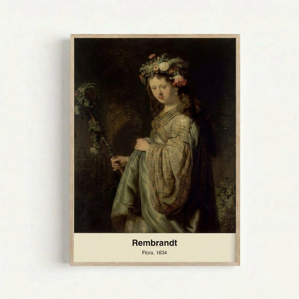 Soft impressionist-style portrait of a flower goddess figure wearing gold jewelry and floral crown, rendered in cream, green, and brown hues on a framed wall art print.