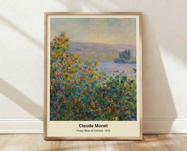 Impressionist painting of vibrant flower beds along a riverside garden, rendered in soft orange, green, and violet tones with luminous white accents, framed poster on wall.