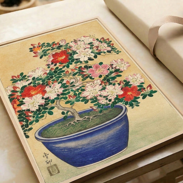 Framed Japandi wall art of a refined azalea bonsai with pale flowers and textured foliage in a blue pot, inspired by classic Japanese woodblock printing traditions.