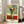 Emotionally charged floral print with abstract interpretation of flowers in a vase, featuring energetic brushwork and a bold palette of warm and cool tones.