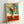 Botanical-themed art print showing an elegant arrangement of stylized flowers in a patterned Chinese vase, executed in a contemporary abstract style.