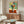Contemporary art print of a flower-filled Chinese vase rendered in vibrant colors and simplified forms, evoking the spirit of early modern painting.
