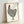 Wabi sabi inspired framed art print showcasing a dotted rooster in minimalist folk style with earthy black and red accents.