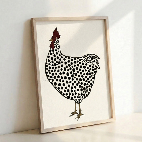 Wabi sabi inspired framed art print showcasing a dotted rooster in minimalist folk style with earthy black and red accents.