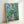 Landscape art print showing a densely wooded forest rendered in harmonious earth tones, creating a meditative and grounded atmosphere.