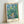 Serene woodland path painting with soft ochre, green, and blue palette, rendered in modern Impressionist style with a contemplative atmospheric quality.