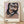 Abstract distorted portrait in lavender, ochre, and charcoal tones depicting a fragmented human head with an existential, psychologically intense mood.