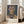 Fragmented abstract portrait with twisted facial geometry in muted ochre, dusty rose, and slate blue; introspective contemporary poster in frame.