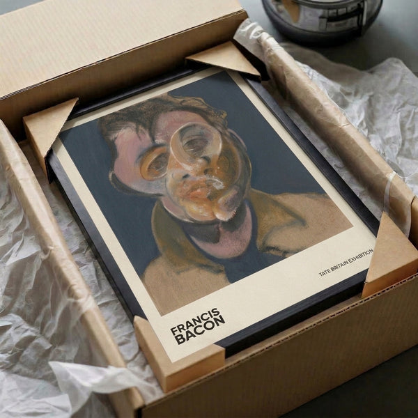 Unsettling abstract portrait with warped features in dusty rose, ochre, and slate blue; introspective modern figurative art print framed on wall.