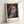 Modern portrait print with gestural brushwork showing a contorted face in rust and pink hues, creating an emotionally raw and introspective composition on cream background.