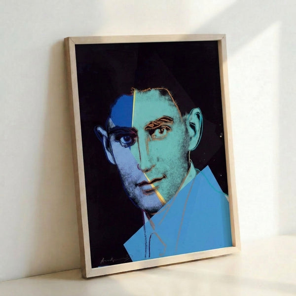 Colorful Warhol-inspired portrait of Franz Kafka with layered ink tones, framed as a contemporary art print.
