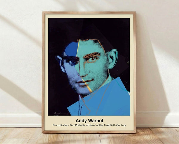 Pop art portrait of a man with a contemplative expression, rendered in muted green, blue, and black tones on a white background, framed as a modern minimalist print on a wall.
