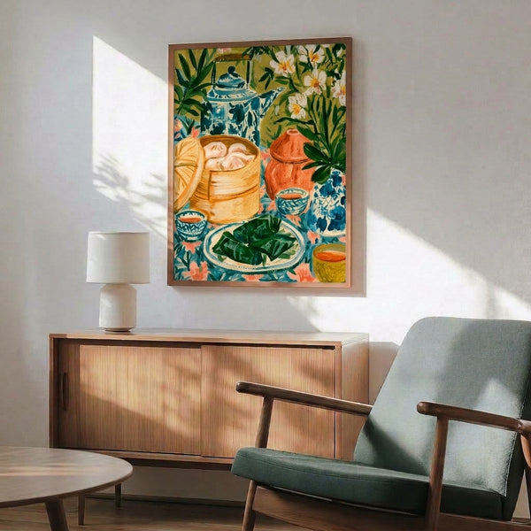 Framed watercolor art print showcasing an intimate still life of tea pottery, garden flowers, and plants in warm sage, golden yellow, and coral accents, evoking cozy domestic serenity.