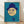 Retro Bauhaus poster featuring a surreal face with a bowler hat and single eye, framed on a wall in turquoise, navy blue, and cream tones.