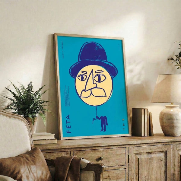 Quirky vintage poster with modernist face illustration, bold navy accents, and playful surreal elements in cream and turquoise palette.