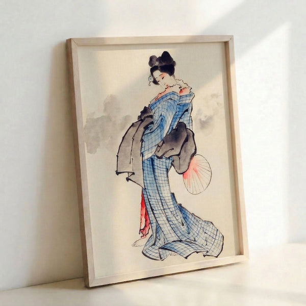 Serene Japanese woodblock artwork of a geisha adorned in a blue checkered kimono, painted in muted cream, black, and pink tones, displayed as a framed decorative print.