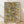 Abstract Bauhaus poster with geometric shapes in gold, gray, and cream on a white background, framed on a wall.