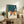 Modern geometric fox illustration in calm teal and warm orange tones gazing up at a crescent moon and scattered stars, minimalist wall art print on cream.