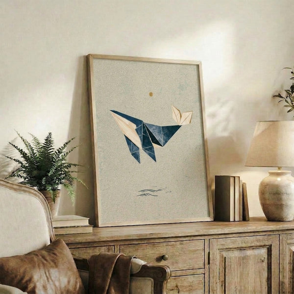 Framed modern art print featuring a geometric whale form in navy blue ascending through layered tan and cream tones with a subtle sun motif, evoking quiet contemplation.