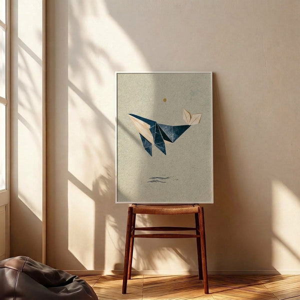 Serene wall art poster displaying a stylized origami whale in navy against cream and ochre water layers, embodying minimalist ocean tranquility and wabi-sabi design.