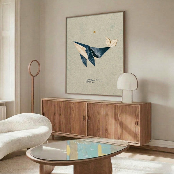 Calm modern poster art of a geometric whale rising through composition of navy, tan, and cream hues with warm sun element, minimalist ocean-inspired decor.
