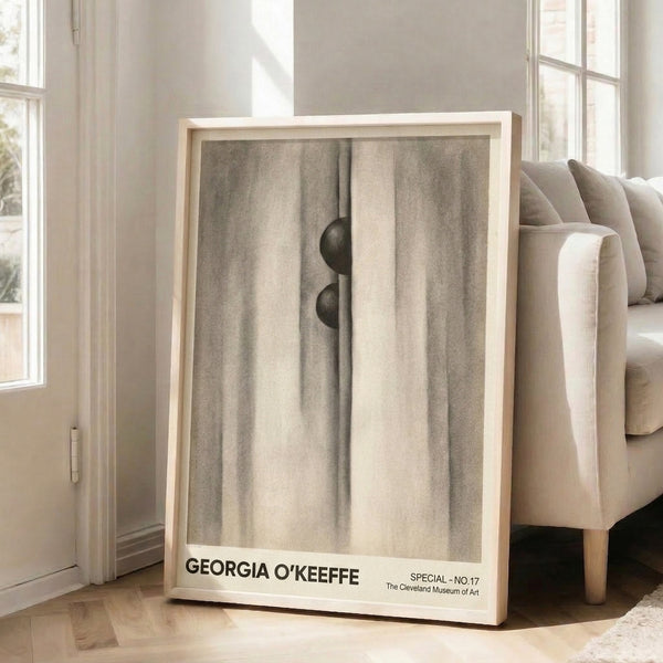 Abstract wall art showing intertwined curtain and sphere shapes in taupe and gray tones, creating a sensual and contemplative mood.