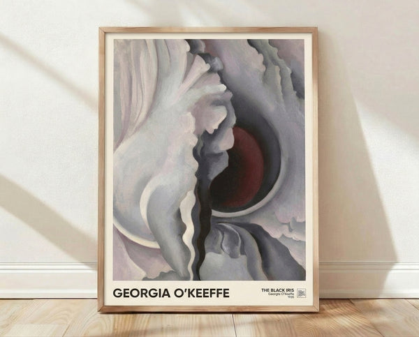 Abstract iris flower in deep burgundy and mauve tones with soft gray and white accents, framed poster art on wall in minimalist modern style.
