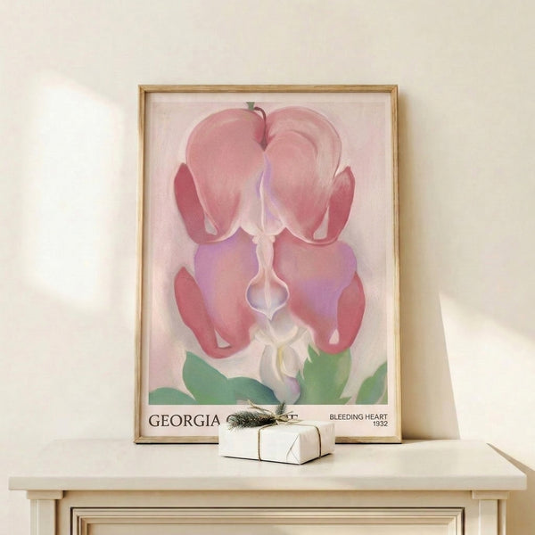 Delicate bleeding heart plant with graceful drooping petals in warm pink and sage green, Art Nouveau poster displayed framed on interior wall.