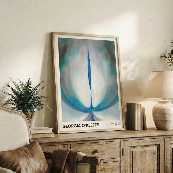 Soft-toned abstract botanical study in cream and pale blue with organic petal-like shapes, capturing serene elegance in modern minimalist style.