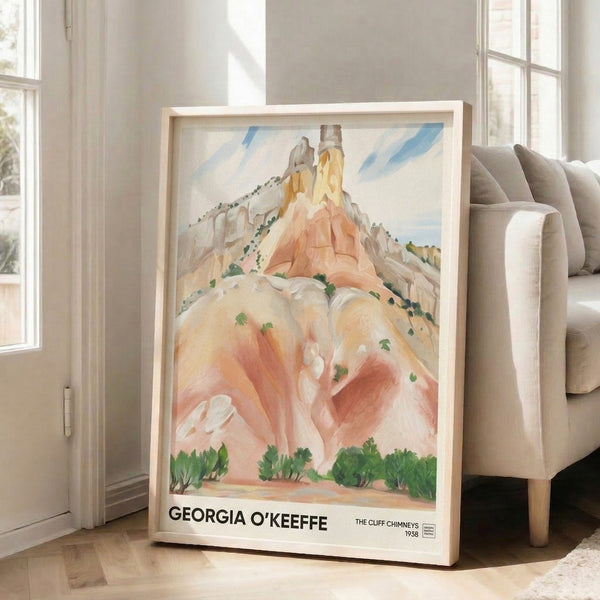 Serene landscape print depicting towering rock formations with impressionistic treatment in cream, pale blue, and warm terracotta against soft green vegetation.