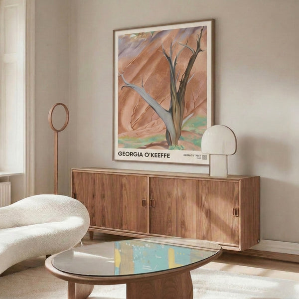 Contemplative impressionist landscape art print featuring sculptural desert forms in cream, ochre, mauve, and muted green tones on display.