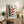 Framed poster of O'Keeffe's celebrated heliconia study, featuring bold botanical abstraction in sky blue, golden yellow, crimson, and emerald on a gallery wall.