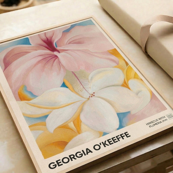 Framed modernist flower poster showcasing ethereal hibiscus and plumeria petals in pink, white, yellow, and muted blue tones in an abstracted, emotionally evocative composition.