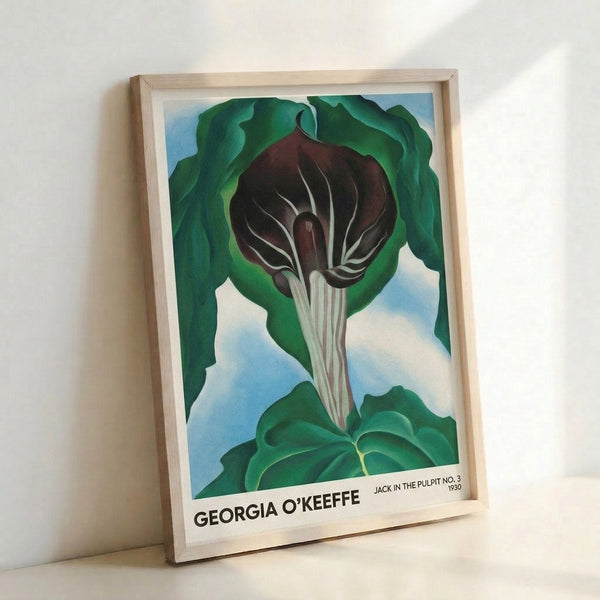 Mid-century modern framed poster of an intimate close-up flower study in burgundy, green, and sky blue, showcasing abstracted plant forms with minimalist sophistication.