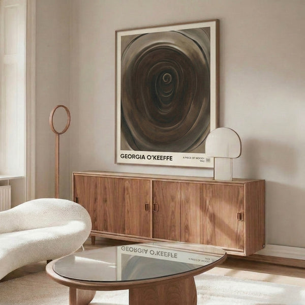 Contemporary abstract wall art with swirling wood grain imagery in soft neutral palette of beige, taupe, and warm brown, evoking calm introspection through organic minimalist design.