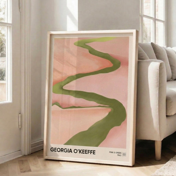 Minimalist poster displaying peaceful interplay of blush pink, cream, and sage green in abstract organic forms on a wall.
