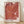 Deep red and coral canna flower petals unfold in sensual, intimate abstraction, a framed vintage masterpiece in warm cream and burgundy tones.