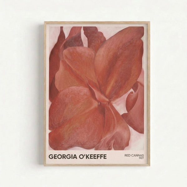 Layered crimson and pale pink canna petals create a contemplative, close-up composition in soft, muted hues on a framed art print.