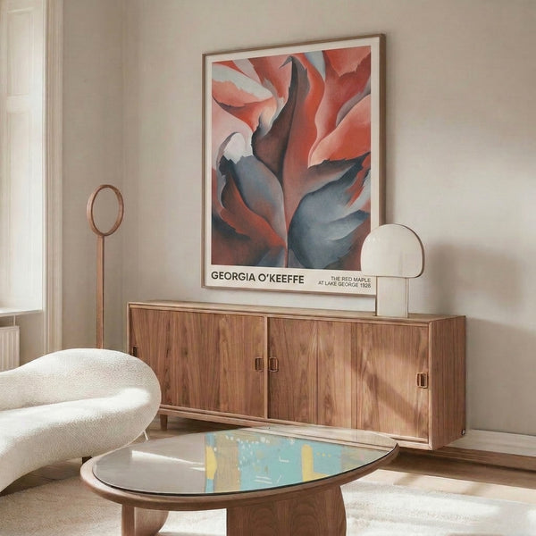 Modernist art print of an abstracted maple form in sensual reds, burgundy, and pale pink against cream and slate blue, framed as a contemplative wall hanging inspired by nature studies.