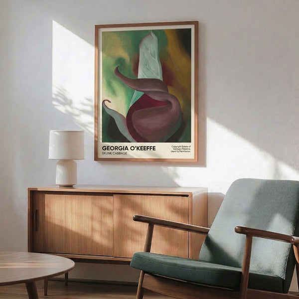 Contemplative abstract flower print with layered organic shapes rendered in cream, deep burgundy, ochre, and sage green on a framed poster.