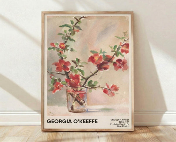 Georgia O'Keeffe-inspired framed watercolor poster featuring a cream vase overflowing with red blossoms and green foliage, rendered in soft impressionist tones.