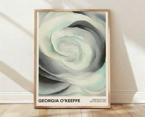 Abstract white rose with soft pale green and cream tones, Georgia O'Keeffe modern minimalist art print framed on wall.