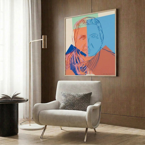 Stylized portrait poster in vibrant pop art colors with bold lines and flattened features, hung as contemporary home decor.