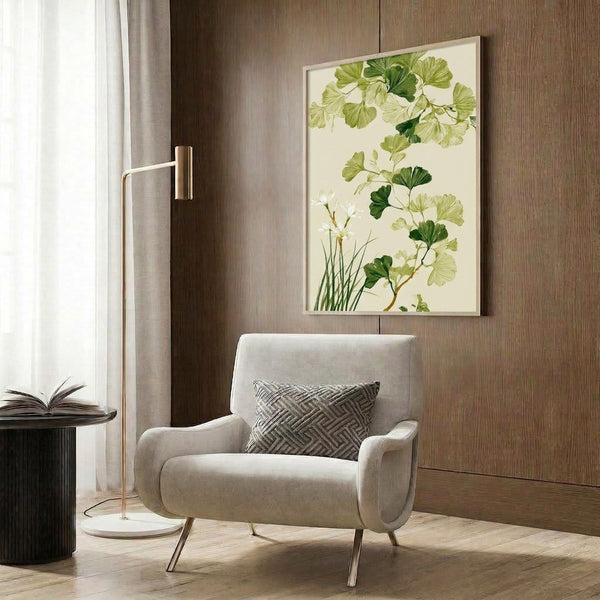 Framed botanical watercolor artwork showing ginkgo leaves and delicate white flowers in cream, pale green, and sage tones with a tranquil, understated aesthetic.