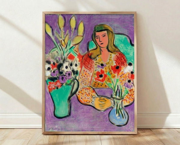 Framed poster print of a girl with anemone flowers on a rich purple background in vibrant watercolor style.